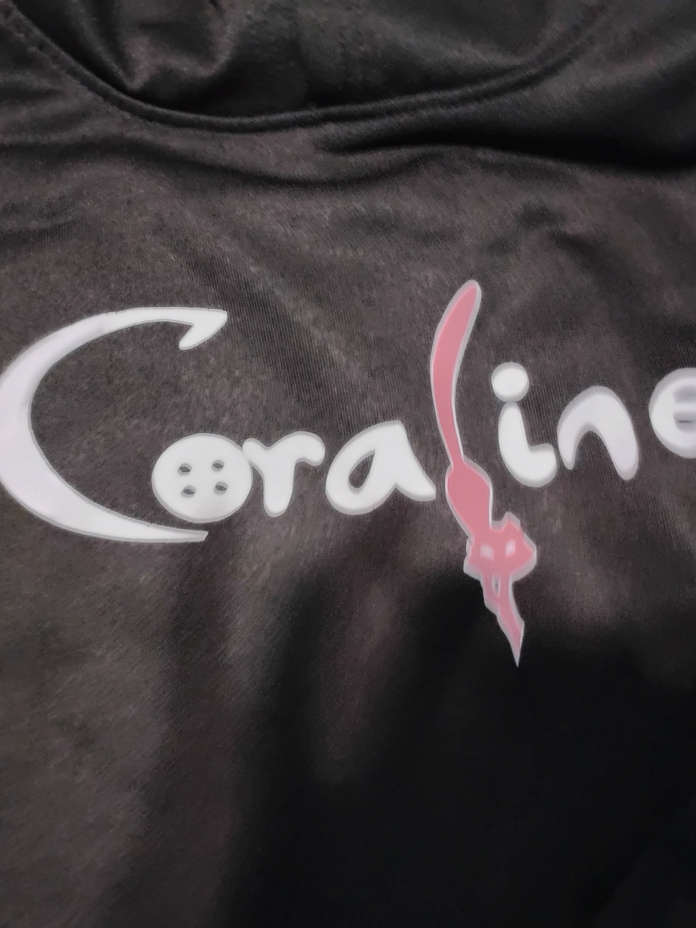 Coraline Graphic Hoodie In Black with Pink Accent